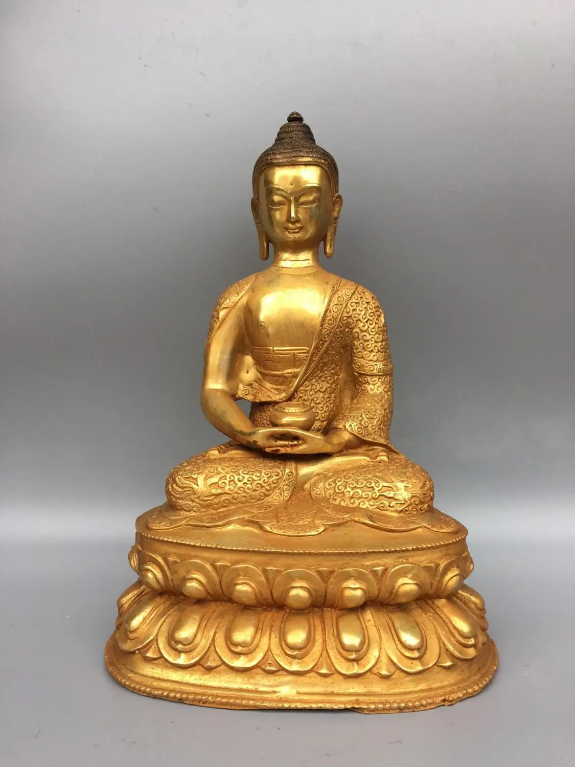 13" Tibet Buddhism Temple Old Bronze Gilt Shakyamuni Medicine Buddha Buddha Statue Ancestor of ten thousand buddhas
13" Tibet Buddhism Temple Old Bronze Gilt Shakyamuni Medicine Buddha Buddha Statue Ancestor of ten thousand buddhas