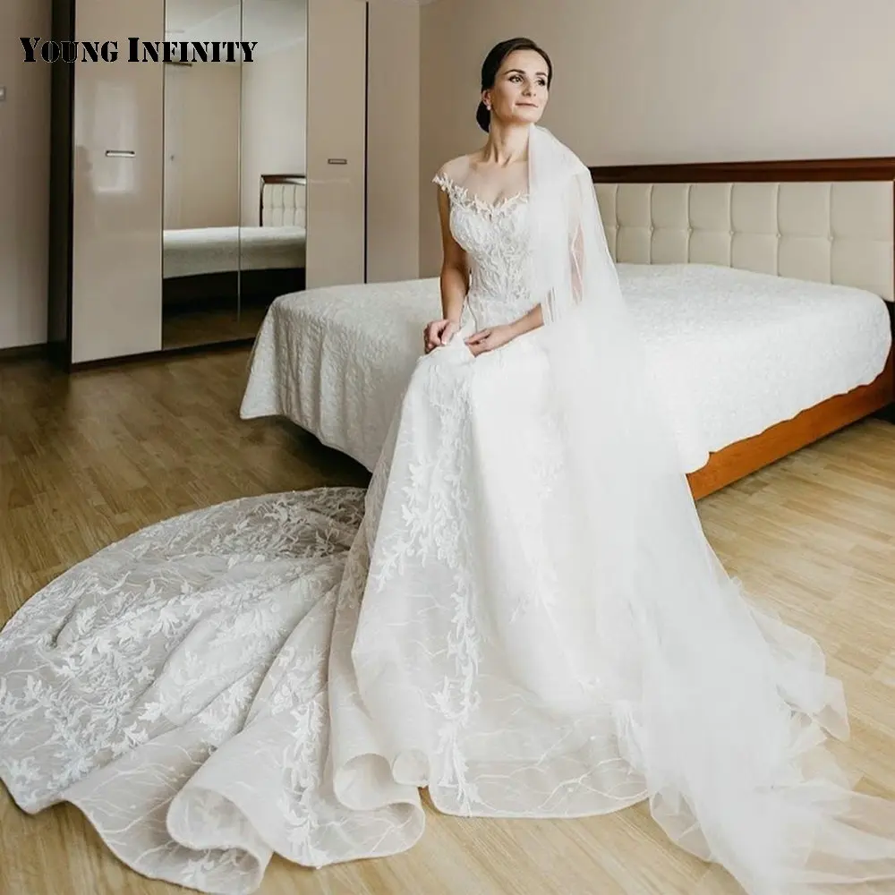 Elegant O Neck Wedding Dress 2022 Cap Sleeves Lace Appliques Beading Court Train Floor Length A Line Bridal Gown
Elegant O Neck Wedding Dress 2022 Cap Sleeves Lace Appliques Beading Court Train Floor Length A Line Bridal Gown