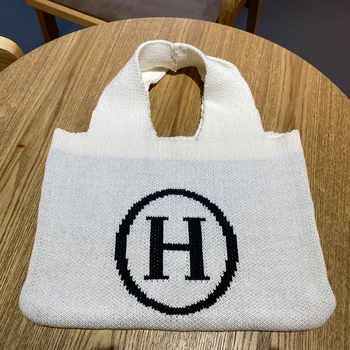 Autumn and winter new Korean plate H letter pack large capacity woven shoulder bag lazy wind knitted wool bag women
Autumn and winter new Korean plate H letter pack large capacity woven shoulder bag lazy wind knitted wool bag women