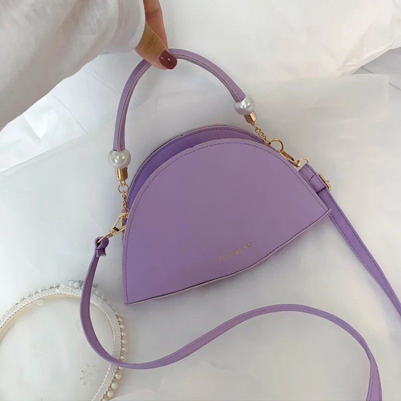 Solid Color Mini Shoulder Bag Female Designer 2020 Fashion New Version Saddle Bag Wild Lady Messenger Bag Shopping Tote Bags
Solid Color Mini Shoulder Bag Female Designer 2020 Fashion New Version Saddle Bag Wild Lady Messenger Bag Shopping Tote Bags