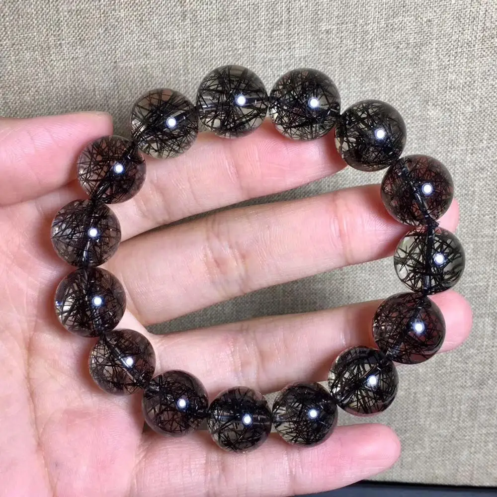 Top Quality 14.2mm Natural Black Hair Rutilated Quartz Bracelet For Women Men Brazil Round Beads Crsytal Bracelet Jewelry AAAAA
Top Quality 14.2mm Natural Black Hair Rutilated Quartz Bracelet For Women Men Brazil Round Beads Crsytal Bracelet Jewelry AAAAA