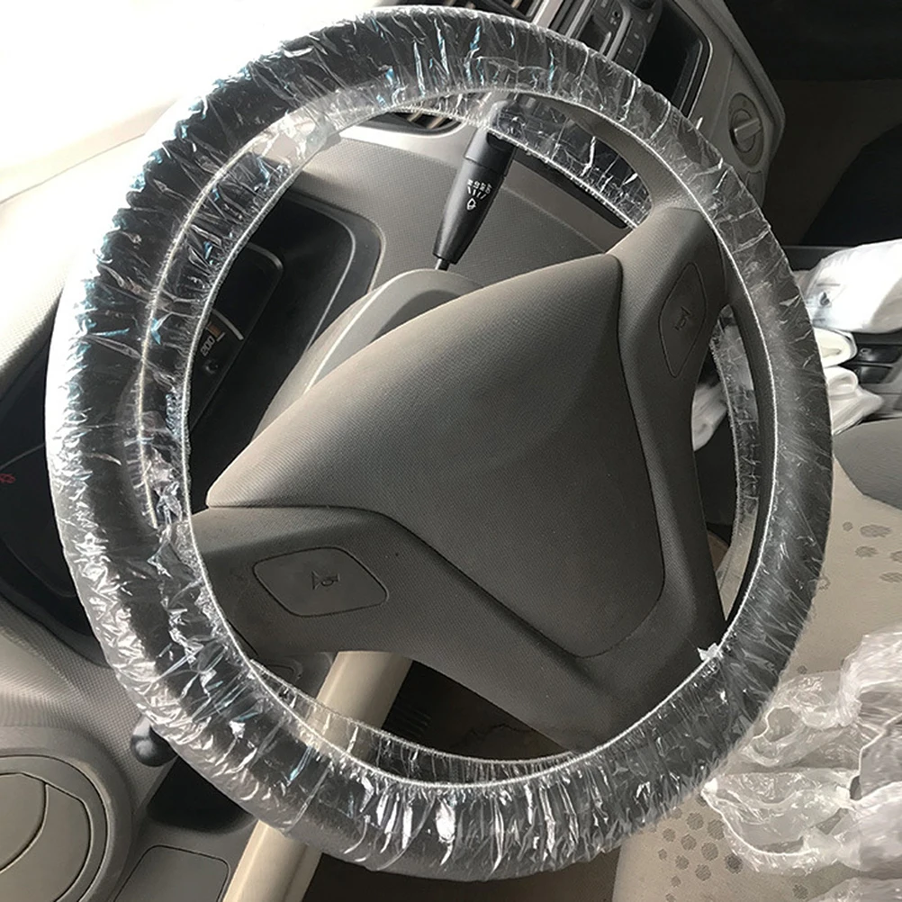 500PCS Disposable Car Steering Wheel Cover Plastic Elastic Pull Handle Sleeve Protector for Auto (White) |