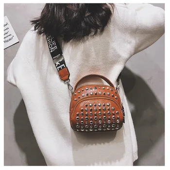 PU leather women bag 2020 new shoulder bag retro fashion rivet decoration handbag casual wild small round bag foreign style
PU leather women bag 2020 new shoulder bag retro fashion rivet decoration handbag casual wild small round bag foreign style