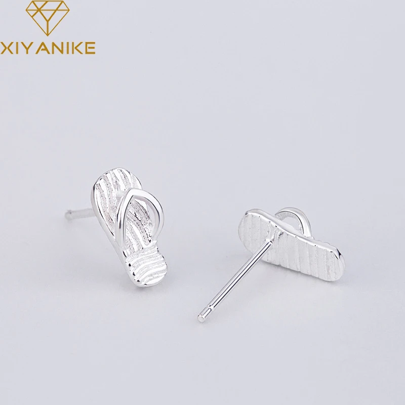 XIYANIKE 925 Sterling Silver Design Creative Flip Flop Stud Earrings Korean Style Fashion Small Ear Hoops Geometric Jewelry
XIYANIKE 925 Sterling Silver Design Creative Flip Flop Stud Earrings Korean Style Fashion Small Ear Hoops Geometric Jewelry