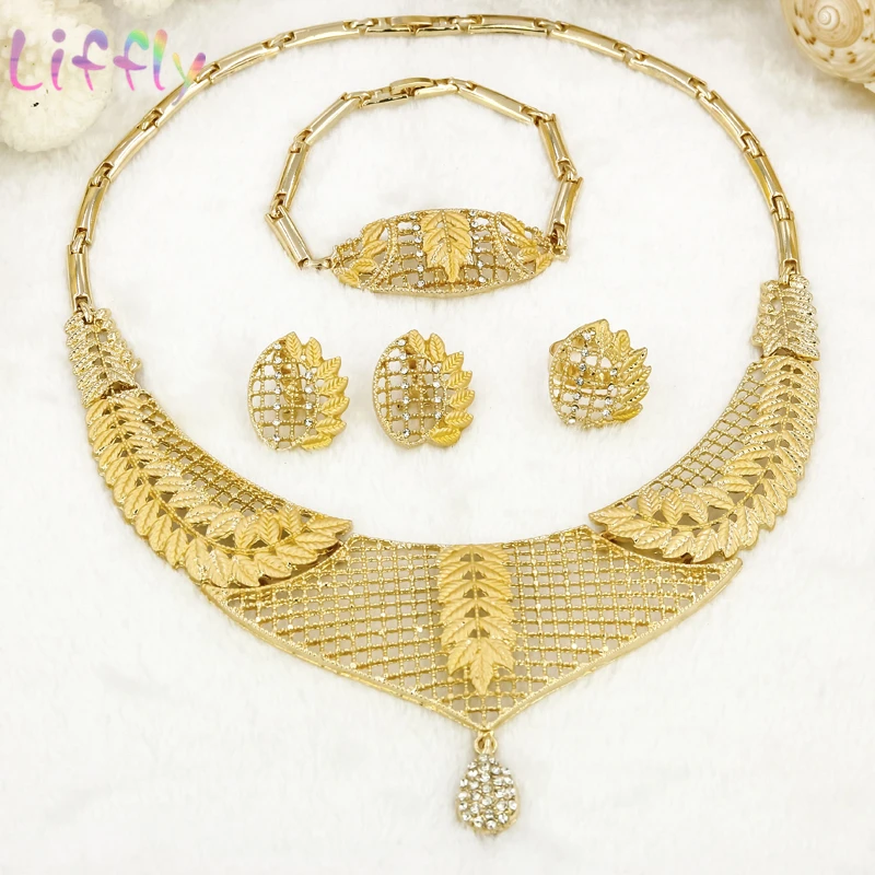 Dubai Women Jewelry Sets for Women Hollow Jewelry Leaf Shape Necklace Classic Crystal Earrings Ring Bracelet Women Party Jewelry
Dubai Women Jewelry Sets for Women Hollow Jewelry Leaf Shape Necklace Classic Crystal Earrings Ring Bracelet Women Party Jewelry