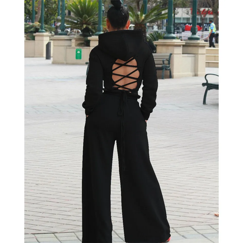 Sexy Hollow Out Bandage Women Suit Solid Color Hooded Wide Leg Pants Set Loose Hoodies Suits Two Piece Set
Sexy Hollow Out Bandage Women Suit Solid Color Hooded Wide Leg Pants Set Loose Hoodies Suits Two Piece Set