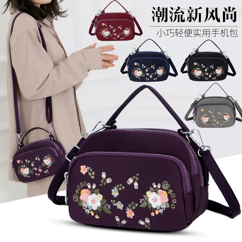 Trend Embroidered Shoulder Bag Versatile Women's Outdoor Travel Shoulder Bag Waterproof Nylon Bag Light Handbag
Trend Embroidered Shoulder Bag Versatile Women's Outdoor Travel Shoulder Bag Waterproof Nylon Bag Light Handbag