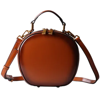 New leather handbag retro apple bag shoulder messenger bag handbag solid color fashion small round bag Fashion Women
New leather handbag retro apple bag shoulder messenger bag handbag solid color fashion small round bag Fashion Women