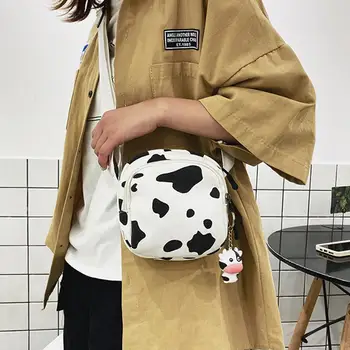 Canvas Handbags Korean Mini Student Bag Cell Phone Bags Girl Cow LED Pendant Canvas Zipper Shoulder Crossbody Bag Phone Pouch 
Canvas Handbags Korean Mini Student Bag Cell Phone Bags Girl Cow LED Pendant Canvas Zipper Shoulder Crossbody Bag Phone Pouch