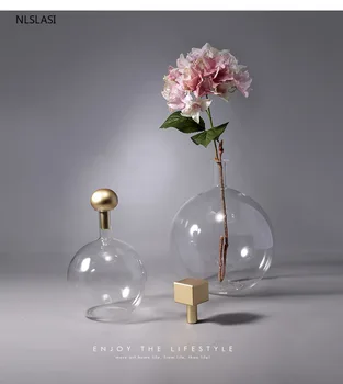 Creative round ball small mouth big belly transparent glass vase metal copper cover design hydroponic flower arrangement
Creative round ball small mouth big belly transparent glass vase metal copper cover design hydroponic flower arrangement