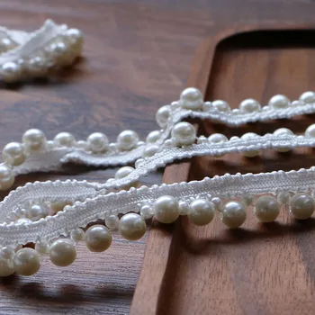 1yard/lot White Pearl Bead lace Ribbon Tape lace fabric Trim Ribbons for DIY Sewing Garments Handmade Clothing Accessories
1yard/lot White Pearl Bead lace Ribbon Tape lace fabric Trim Ribbons for DIY Sewing Garments Handmade Clothing Accessories