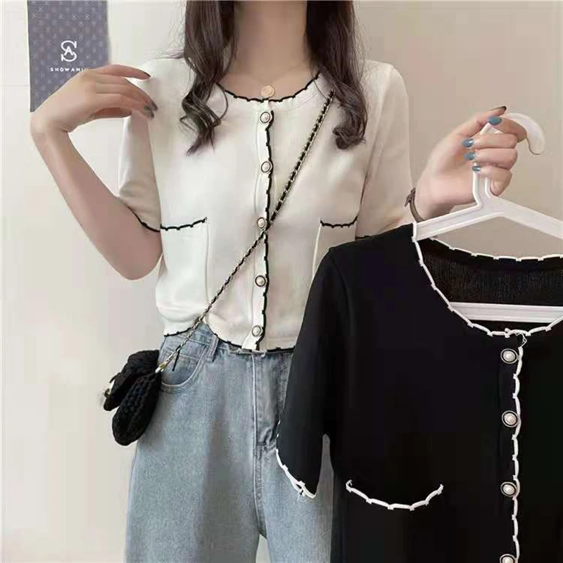 2021 Korean Fashion Women Casual Knitted Short Sleeve Thin Sweaters Office Lady Chic Single-breasted Tops Sexy Crop Tees Female
2021 Korean Fashion Women Casual Knitted Short Sleeve Thin Sweaters Office Lady Chic Single-breasted Tops Sexy Crop Tees Female