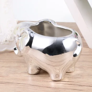 Creative Ceramic Flower Pot Cute Elephant Shape Design Flower Pot Fleshy Flower pot Garden Decoration Table Decoration (Golden)
Creative Ceramic Flower Pot Cute Elephant Shape Design Flower Pot Fleshy Flower pot Garden Decoration Table Decoration (Golden)