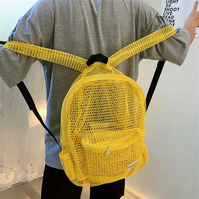 Ultra-light transparent shoulder bags for men and women ultra-fire simple hollow mesh backpack Chao brand student bags 
Ultra-light transparent shoulder bags for men and women ultra-fire simple hollow mesh backpack Chao brand student bags