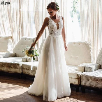 Bohemia Wedding Dresses Tulle V Neck Lace Appliques Sleeveless A Line Beach Boho Bridal Gowns Vestido de Noiva Open Back Custom
Bohemia Wedding Dresses Tulle V Neck Lace Appliques Sleeveless A Line Beach Boho Bridal Gowns Vestido de Noiva Open Back Custom