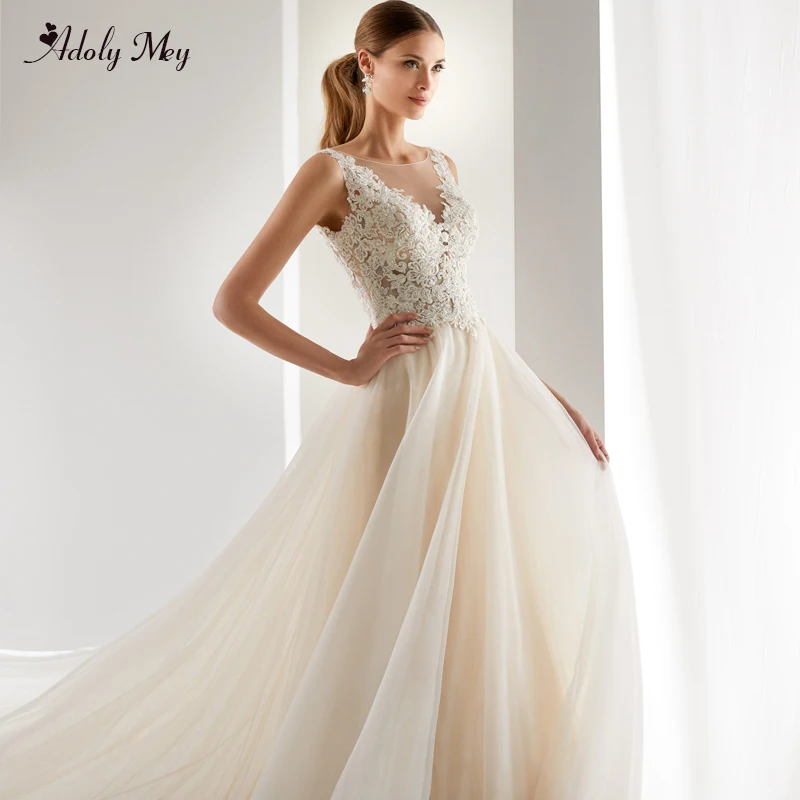 Adoly Mey Design Luxury Appliques Beaded A-Line Wedding Dresses 2020 New Elegant Scoop Neck Button Vintage Bridal Gown Plus Size 
Adoly Mey Design Luxury Appliques Beaded A-Line Wedding Dresses 2020 New Elegant Scoop Neck Button Vintage Bridal Gown Plus Size