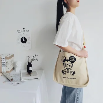 Korean version of the retro shoulder canvas bag literary bag female student button adjustable shoulder strap messenger bag
Korean version of the retro shoulder canvas bag literary bag female student button adjustable shoulder strap messenger bag