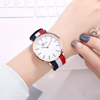Quartz Wrist Watch Simple Style Striped Pin Buckled Canvas Band Strap Wristwatch Decoration Wrist Watch for Women Men Students
Quartz Wrist Watch Simple Style Striped Pin Buckled Canvas Band Strap Wristwatch Decoration Wrist Watch for Women Men Students