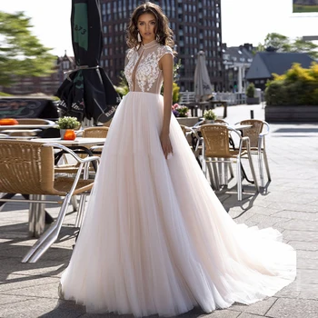 Eightree A Line Wedding Dresses Lace Appliques Cap Sleeves Bridal Gowns Beach Boho Backless Bride Dresses Vestido De Noiva
Eightree A Line Wedding Dresses Lace Appliques Cap Sleeves Bridal Gowns Beach Boho Backless Bride Dresses Vestido De Noiva