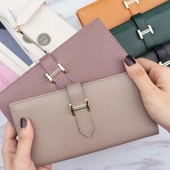 2020 new European and American classic drawstring long ladies wallet first layer cowhide leather clutch bag long clip 
2020 new European and American classic drawstring long ladies wallet first layer cowhide leather clutch bag long clip