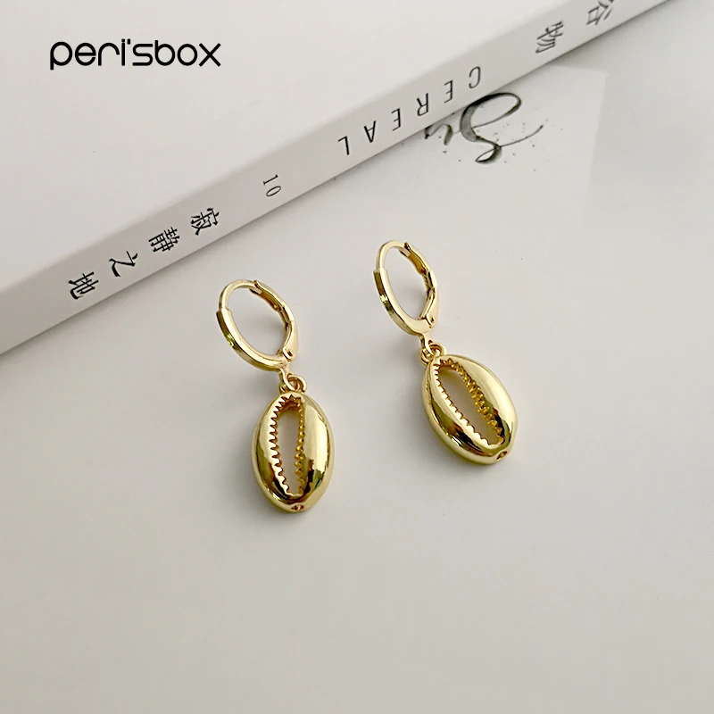 Peri'sBox Gold Shell Huggie Earrings Unique Cowrie Shell Hoop Earrings Summer Boho Brass Charm Hoops pendientes mujer moda 2019
Peri'sBox Gold Shell Huggie Earrings Unique Cowrie Shell Hoop Earrings Summer Boho Brass Charm Hoops pendientes mujer moda 2019