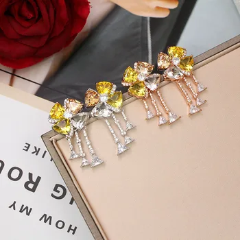 New triangular colour jewel earrings with micro - zircon-inlaid high - grade fringe earrings for ladies
New triangular colour jewel earrings with micro - zircon-inlaid high - grade fringe earrings for ladies