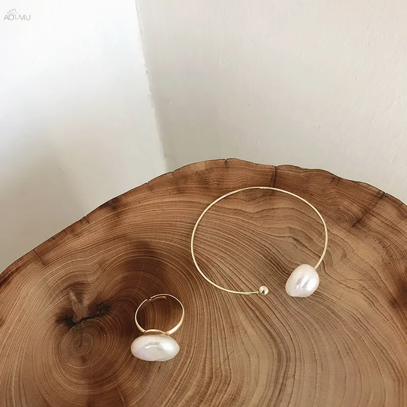 AOMU Korea Simple Street Shoot Bangle Baroque Irregular Natural Imitation Pearl Bangle Opening For Women Girls Jewelry
AOMU Korea Simple Street Shoot Bangle Baroque Irregular Natural Imitation Pearl Bangle Opening For Women Girls Jewelry