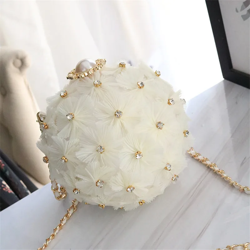 2019 Summer New Female Bag Small Fairy Fairy Rhinestone Flower Shoulder Portable Messenger Bag Chain Small Round Bag
2019 Summer New Female Bag Small Fairy Fairy Rhinestone Flower Shoulder Portable Messenger Bag Chain Small Round Bag