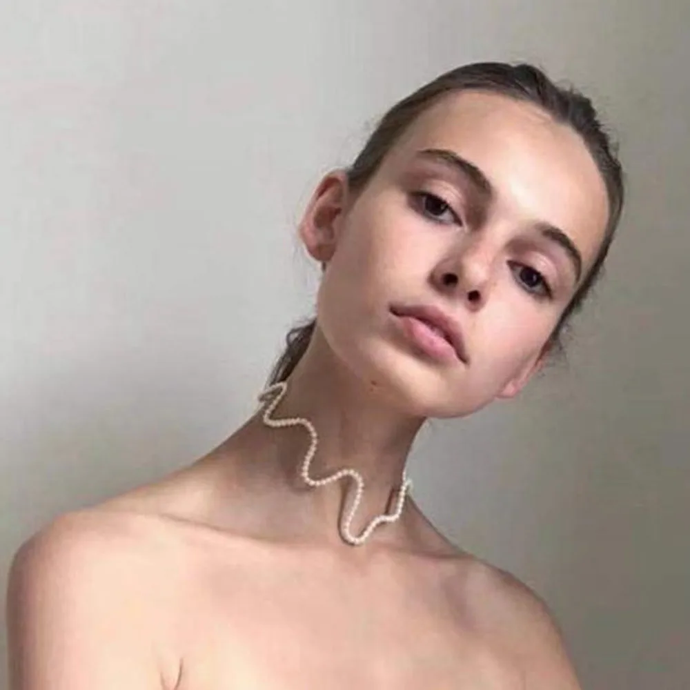 Wave pearl short choker necklace for women fashion 2019 
Wave pearl short choker necklace for women fashion 2019
