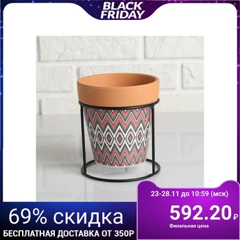 Ceramic planter Terracotta with a color pattern on a round met. stand 13 * 14cm 5010677
Ceramic planter Terracotta with a color pattern on a round met. stand 13 * 14cm 5010677