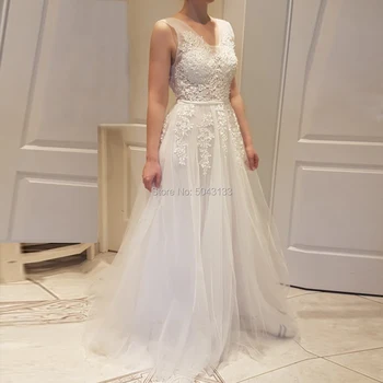Lace Applique A Line Wedding Dresses 2020 V Neck Off the Shoulder Floor Length Bridal Gowns Lace Up Ivory Vestido de Noiva 
Lace Applique A Line Wedding Dresses 2020 V Neck Off the Shoulder Floor Length Bridal Gowns Lace Up Ivory Vestido de Noiva