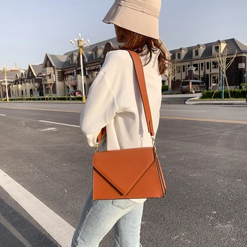 bags for women 2020 Solid PU leather triangle bag cover Shoulder Messenger Bag sac a main femme crossbody bags for women 
bags for women 2020 Solid PU leather triangle bag cover Shoulder Messenger Bag sac a main femme crossbody bags for women