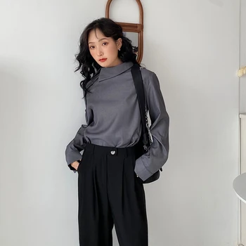 Autumn new style independent design oblique placket button decoration long-sleeved shirt loose and handsome blouse 
Autumn new style independent design oblique placket button decoration long-sleeved shirt loose and handsome blouse