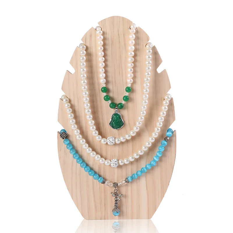 Novelty Handmade Wooden Flame Shape Necklace Chain Jewelry Display Stand Wedding Party Gift
Novelty Handmade Wooden Flame Shape Necklace Chain Jewelry Display Stand Wedding Party Gift