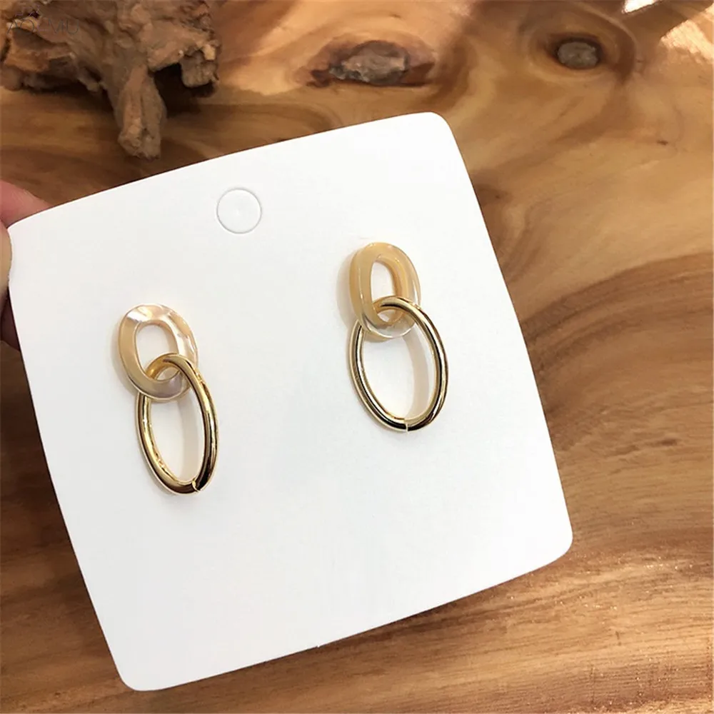 AOMU Simple Trendy Matte Geometric Shell Metal Gold Hollow Elliptical Stud Earrings for Women Birthday Gifts Party Jewelry
AOMU Simple Trendy Matte Geometric Shell Metal Gold Hollow Elliptical Stud Earrings for Women Birthday Gifts Party Jewelry
