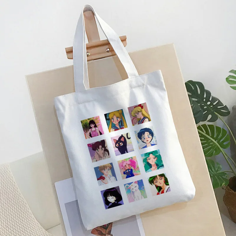 Japanese Sailor Moon Cute Water Ice Moon Print Shoulder Canvas Bags New Harajuku Cartoon Fun College Wind Open Handbag Women Bag
Japanese Sailor Moon Cute Water Ice Moon Print Shoulder Canvas Bags New Harajuku Cartoon Fun College Wind Open Handbag Women Bag