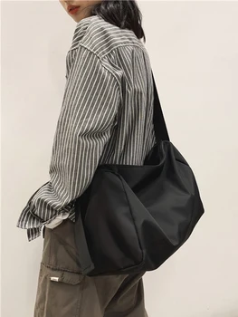 Extra-large black waterproof students to go out For class Korean version light simple solid-color bags
Extra-large black waterproof students to go out For class Korean version light simple solid-color bags
