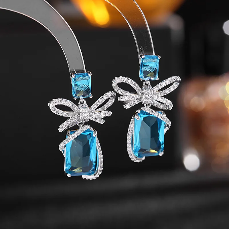 Bowknot Crystal Earrings серьги 2022 тренд pendientes Luxury Brand Jewelry Women Fashion Wedding Party Bridal Dangle Earings
Bowknot Crystal Earrings серьги 2022 тренд pendientes Luxury Brand Jewelry Women Fashion Wedding Party Bridal Dangle Earings