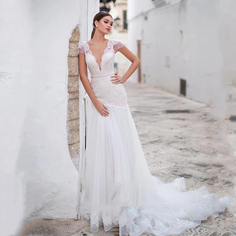 Latest Charming Mermaid Wedding Dresses Lace Short Sleeves Wedding Gowns Illusion Buttons Back Bridal Dress Court Train Applique
Latest Charming Mermaid Wedding Dresses Lace Short Sleeves Wedding Gowns Illusion Buttons Back Bridal Dress Court Train Applique