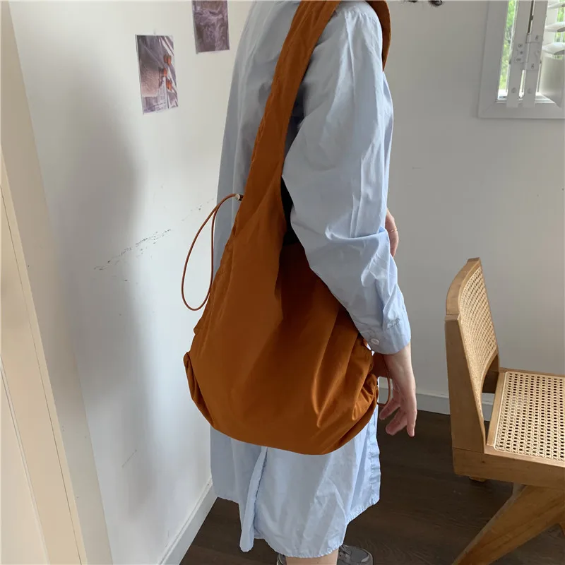 Korean Style Shoulder Bag Nylon Drawstring Bucket Bag Simple Shopping Handbag Casual Trend Fashion
Korean Style Shoulder Bag Nylon Drawstring Bucket Bag Simple Shopping Handbag Casual Trend Fashion
