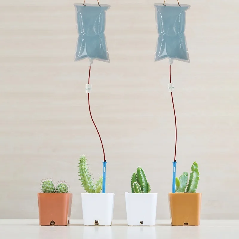 Automatic Watering Device Watering Water Bag Drip Arrow Plant Irrigation Tool Lazy Planting Kit Irrigation System For greenhouse
Automatic Watering Device Watering Water Bag Drip Arrow Plant Irrigation Tool Lazy Planting Kit Irrigation System For greenhouse