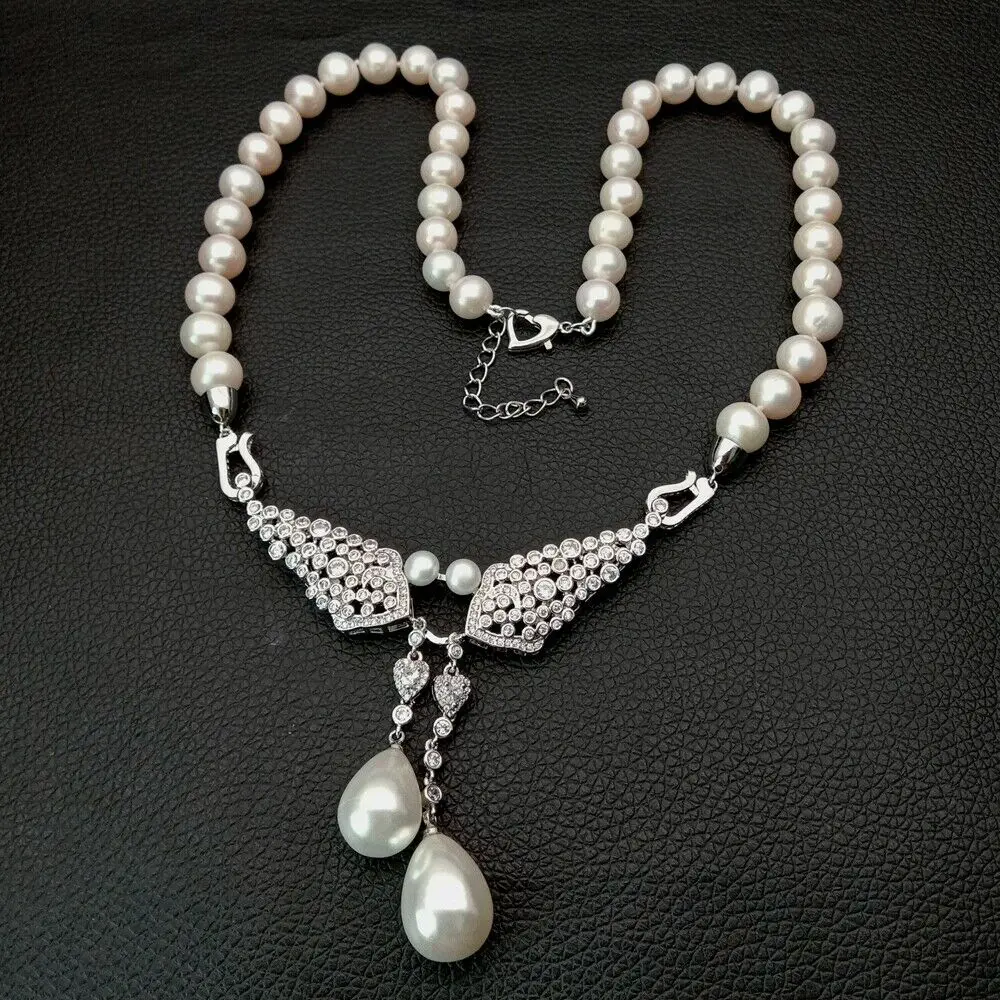 20" natural Cultured White freshwater Pearl Necklace Sea Shell Pearl zircon Pendant
20" natural Cultured White freshwater Pearl Necklace Sea Shell Pearl zircon Pendant