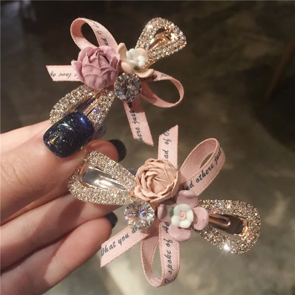 Korean Fashion Flower Hair Clip Crystal Bow Ribbon Hairpins Shiny Rhinestones Boutique Women Hair Accessories Ponytail Holder
Korean Fashion Flower Hair Clip Crystal Bow Ribbon Hairpins Shiny Rhinestones Boutique Women Hair Accessories Ponytail Holder