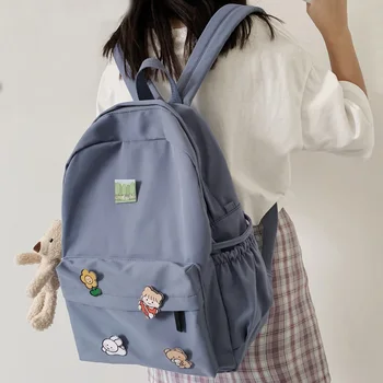 DCIMOR New Waterproof nylon Women backpack Female Cartoon badge Schoolbag for teenage girls Travel Backpack Solid Color Mochilas 
DCIMOR New Waterproof nylon Women backpack Female Cartoon badge Schoolbag for teenage girls Travel Backpack Solid Color Mochilas