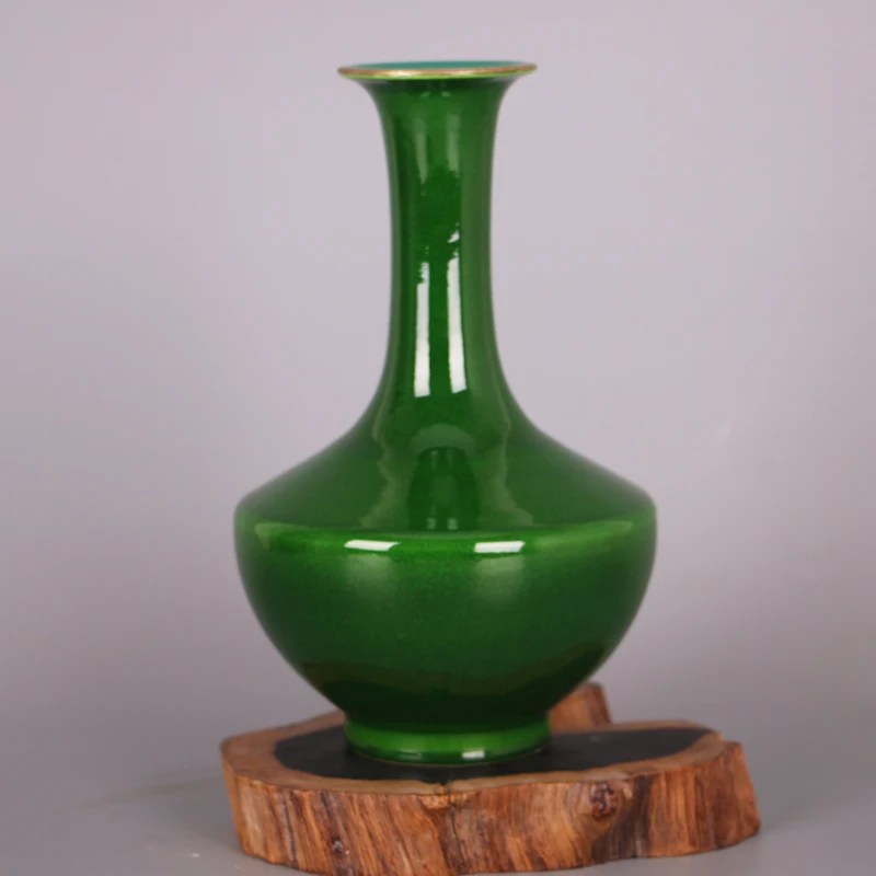 

Qing Dynasty Qianlong year mark gem green glaze flat belly vase imitation Qing Dynasty used palace Antique Home Furnishings