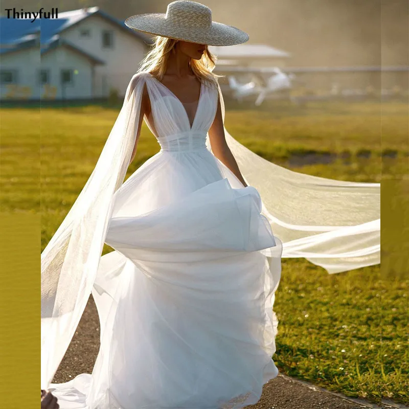Thinyfull Bohemian Wedding Dresses 2021 Sheer V-Neck Backless Beach A-Line Simple Country Bridal Gowns Robes De Mariee
Thinyfull Bohemian Wedding Dresses 2021 Sheer V-Neck Backless Beach A-Line Simple Country Bridal Gowns Robes De Mariee