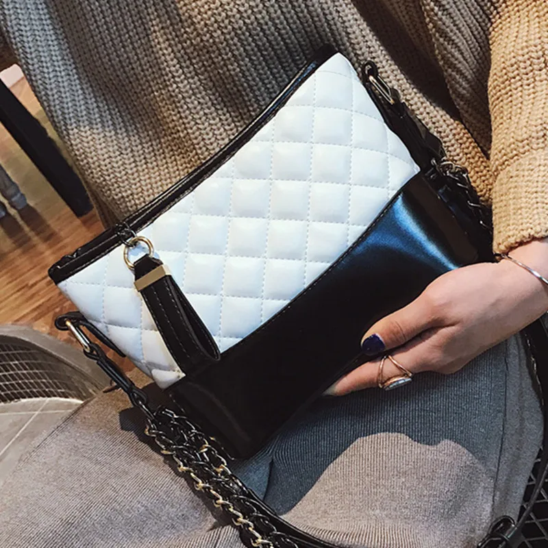 New Ins Small Xiangfeng Lingge Chain Tramp Bag Fashion Color Contrast Single Shoulder Slant Span Small Bag 
New Ins Small Xiangfeng Lingge Chain Tramp Bag Fashion Color Contrast Single Shoulder Slant Span Small Bag
