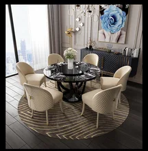 Rock slab dining table simple rectangular light luxury stainless steel dining table and chairs high-end villa furniture
Rock slab dining table simple rectangular light luxury stainless steel dining table and chairs high-end villa furniture