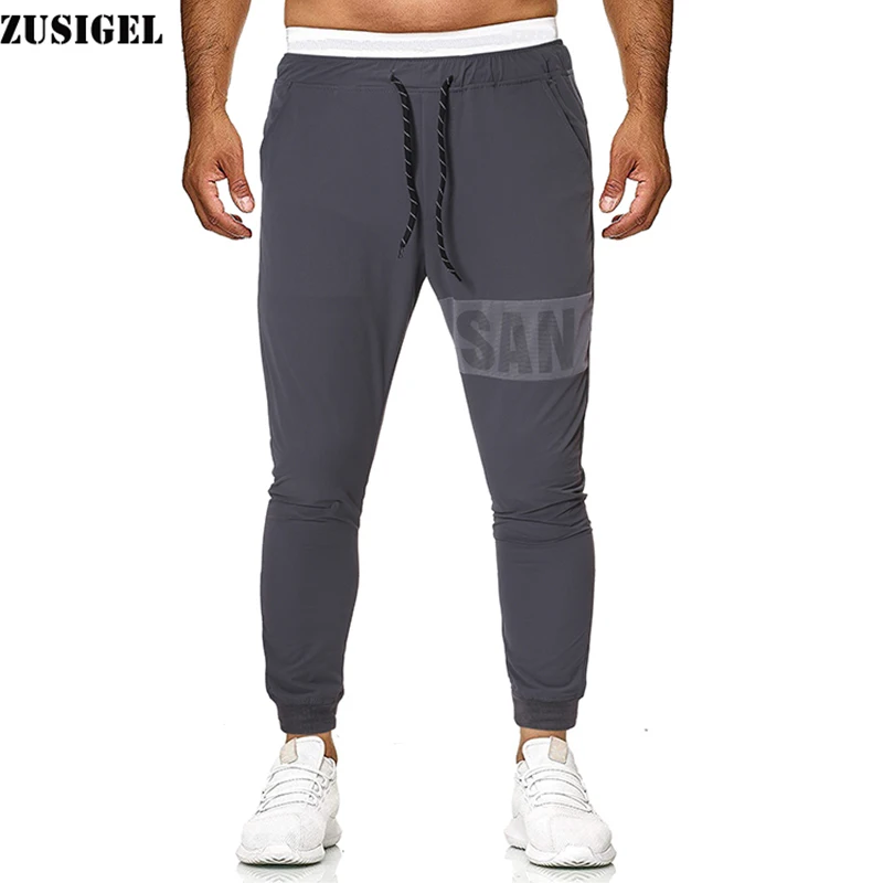 ZUSIGEL Men Black Mesh Pants New Autumn Letter Print Running Jogger Pants Drawstring Middle Waist Sweatpants Trousers
ZUSIGEL Men Black Mesh Pants New Autumn Letter Print Running Jogger Pants Drawstring Middle Waist Sweatpants Trousers