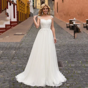 Boho Simple A Line Tulle Wedding Dresses Appliques Lace Custom Made Illusion Back Sleeveless Beading Bridal Gowns
Boho Simple A Line Tulle Wedding Dresses Appliques Lace Custom Made Illusion Back Sleeveless Beading Bridal Gowns